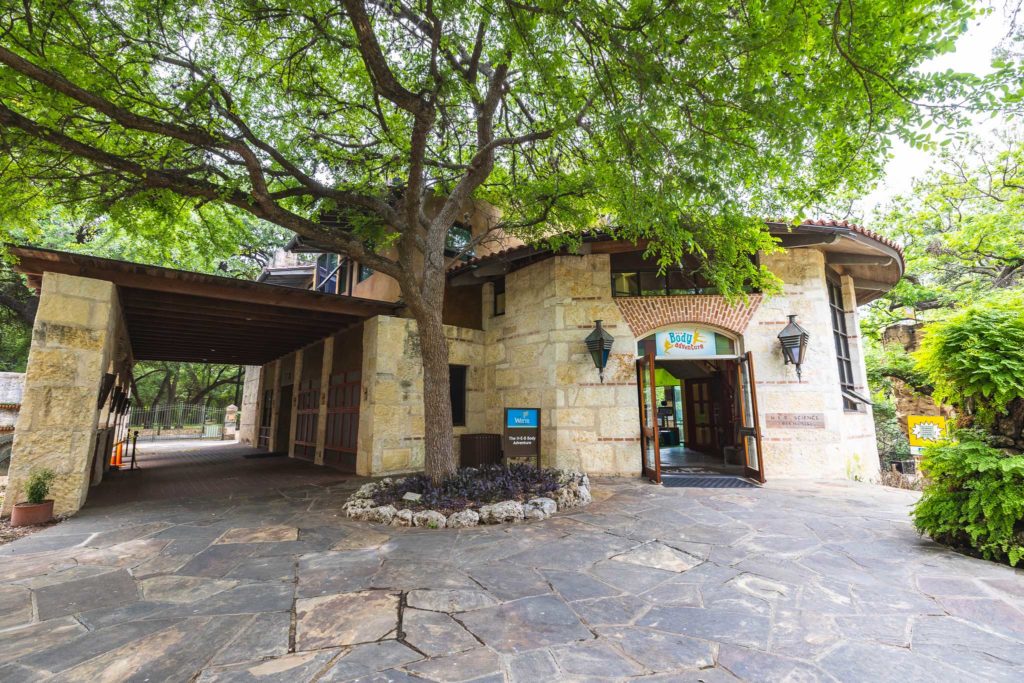 exterior shot building surrounded by trees