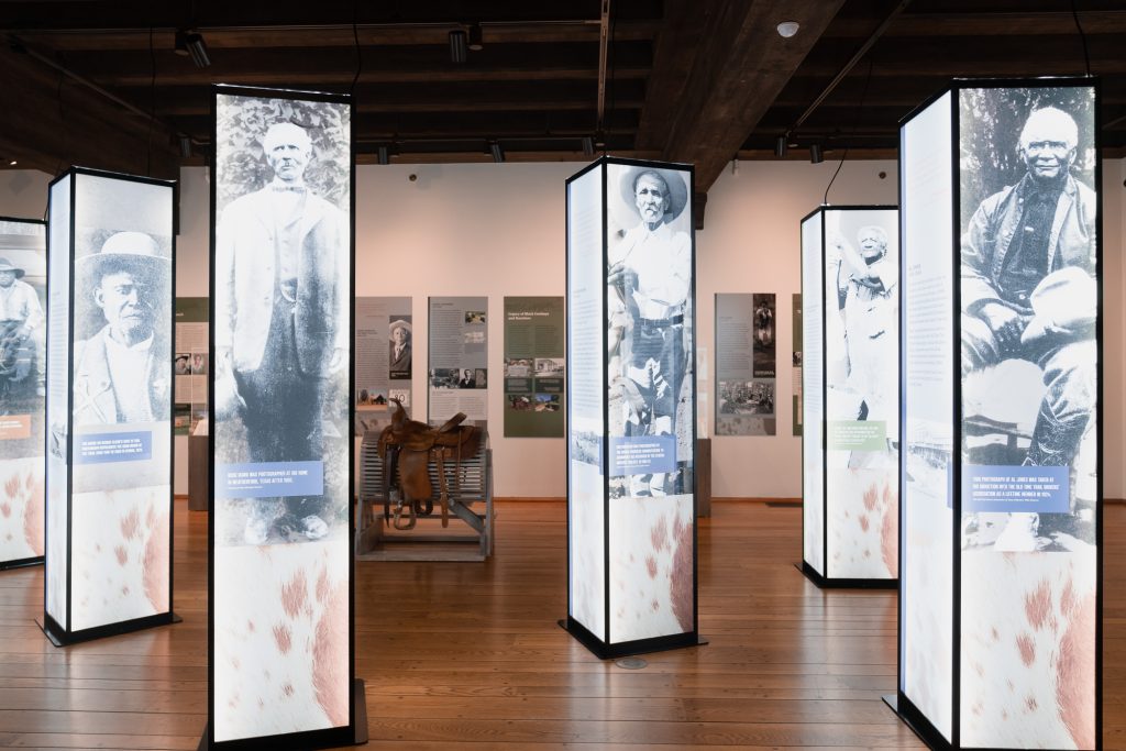 Inside the Black Cowboys exhibition. Photo credit to Two Sapphires photography.